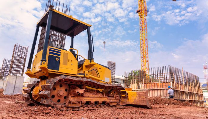 excavator-working-with-earth-sand-sandpit-foundation-work-building_61243-1172